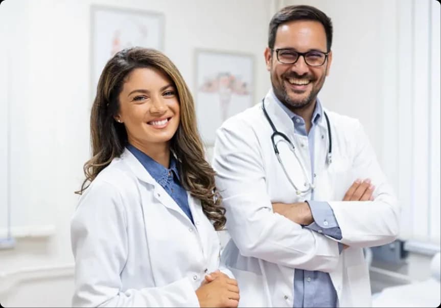 Healthcare professionals smiling in a clinic